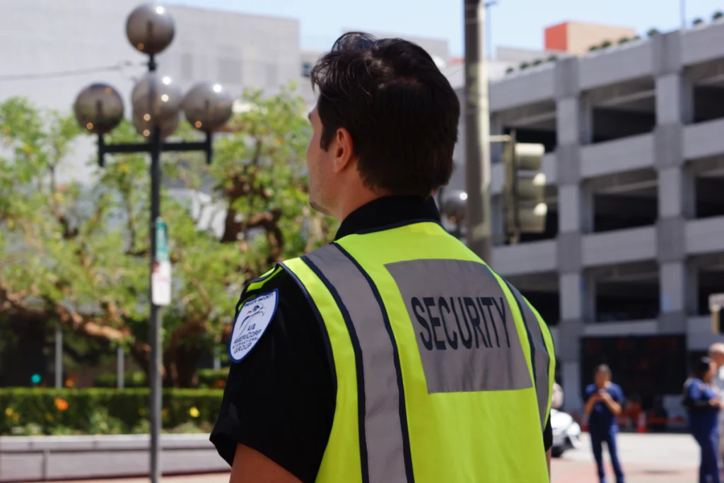 AIG Security unarmed officer in a hi-visibility vest on patrol